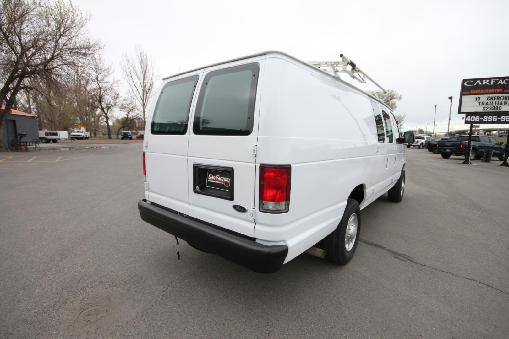 2014 White /Grey Ford E-Series Van (1FTSS3EL3ED) with an 5.4L V8 engine, Automatic transmission, located at 4562 State Avenue, Billings, MT, 59101, (406) 896-9833, 45.769516, -108.526772 - 2014 Ford E-350 Super Duty Extended Cargo Van - One owner - 62,000 miles! 5.4L V8 SOHC 16V FFV Engine - 4 speed automatic transmission - rear wheel drive - 62,752 miles - One owner - Inspected and serviced - Ready to go to work today! Air conditioning - tilt steering wheel - AM/FM audio - powe - Photo#4